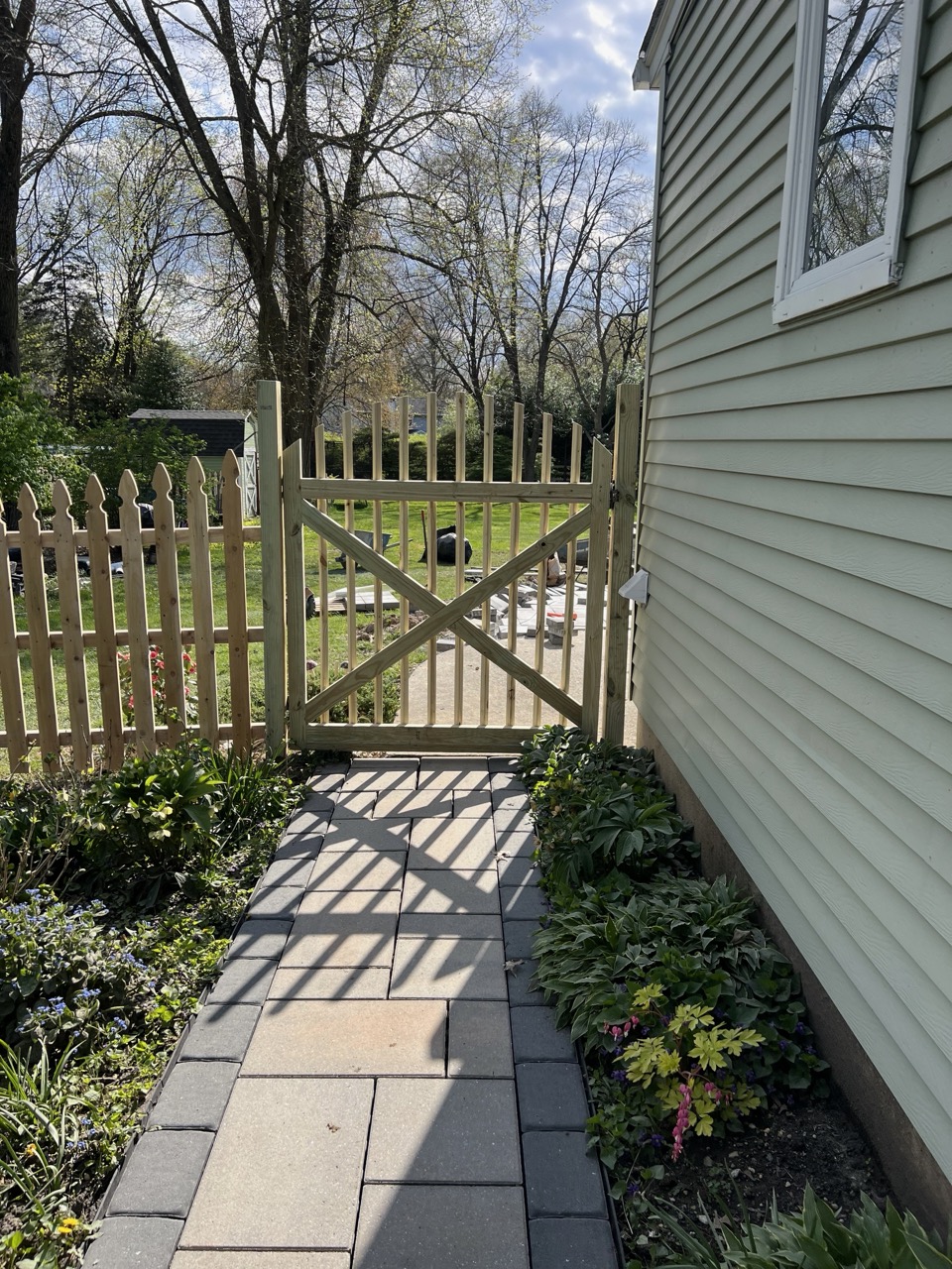 Fence renovation detail with improved wood slats
