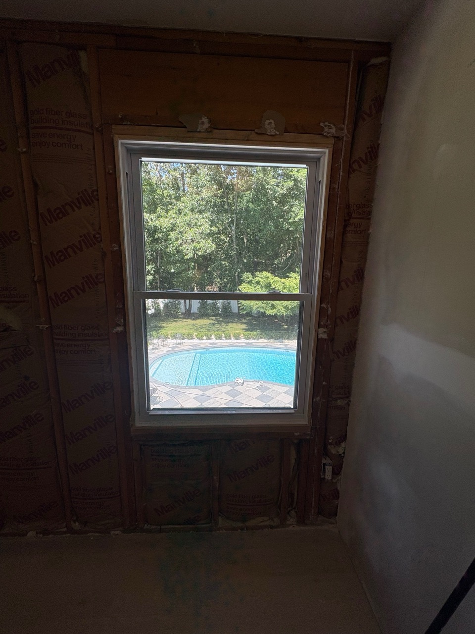 Room renovation before image showing original layout and condition