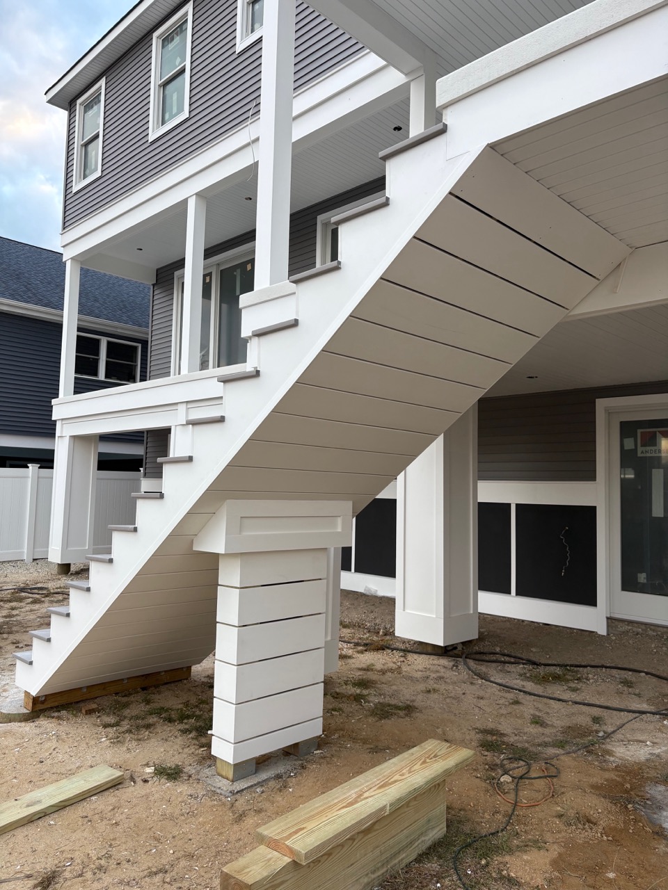 Staircase remodel with updated railing and modernized steps